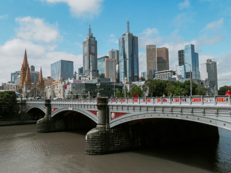 Melbourne city skyline behind Princes Bridge on a sunny day